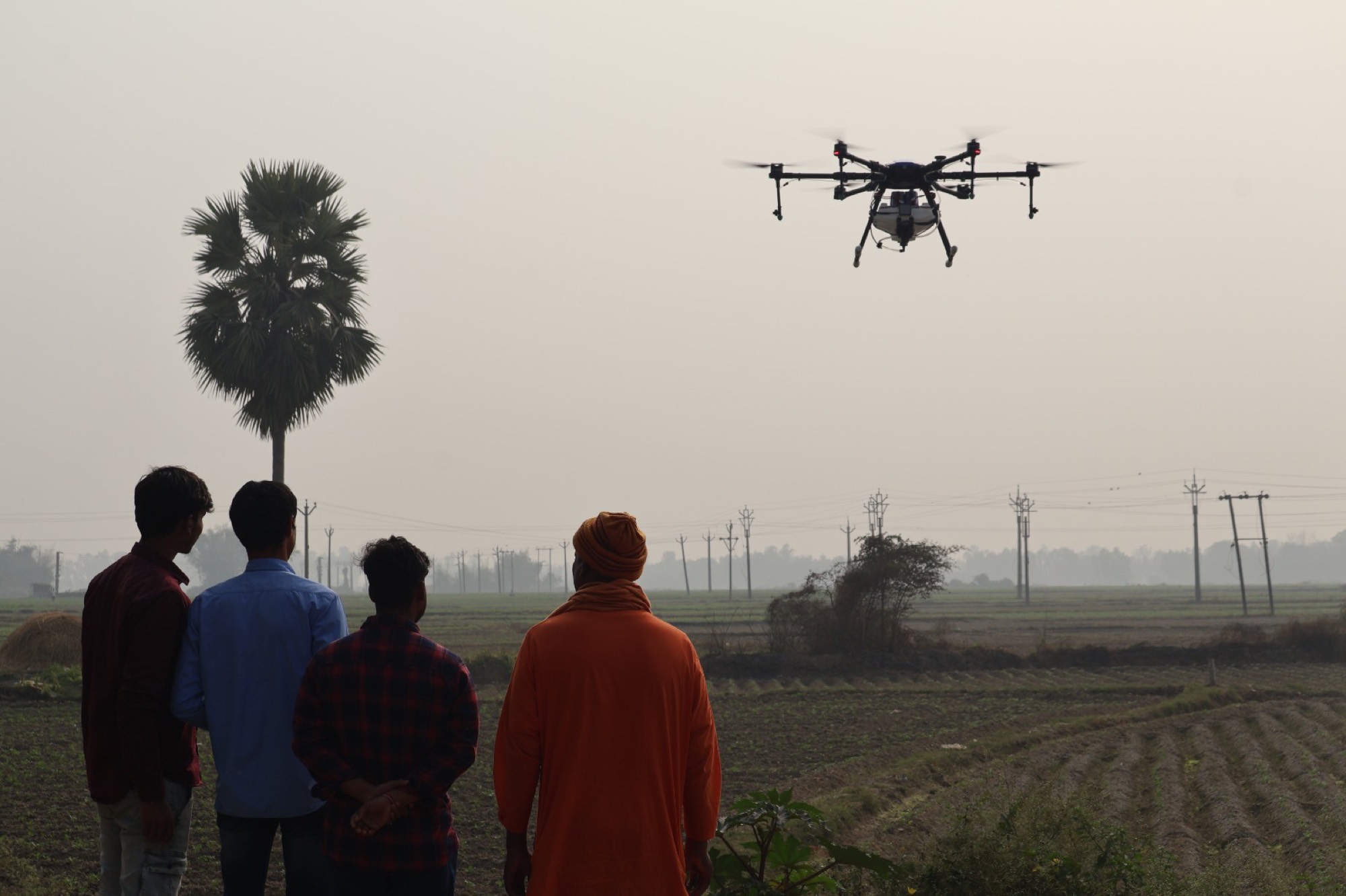Krishi-EL in flight over farmland at Ramakrishna Mission, Kamarpukur